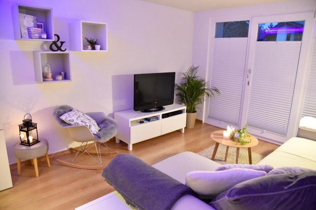TV at/o entertainment center sa Anzère, appartement cozy au coeur des Alpes