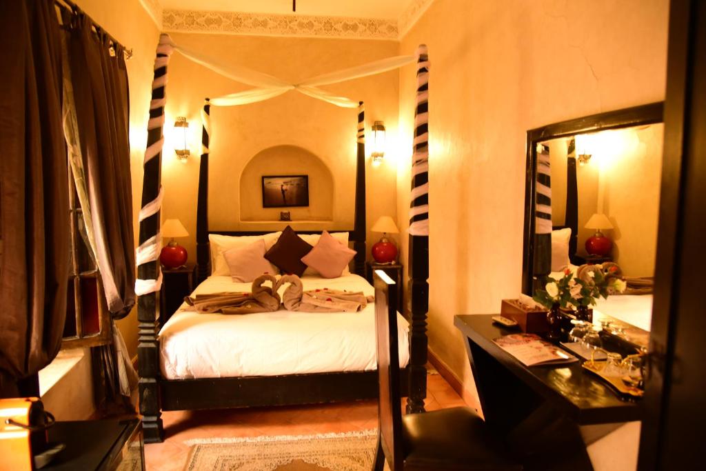 Postel nebo postele na pokoji v ubytování Riad Du Petit Prince