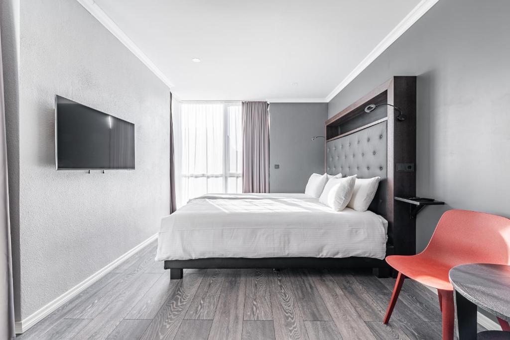 Postel nebo postele na pokoji v ubytování Hotel Aska