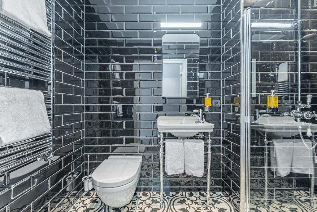 Koupelna v ubytování Hotel Aska