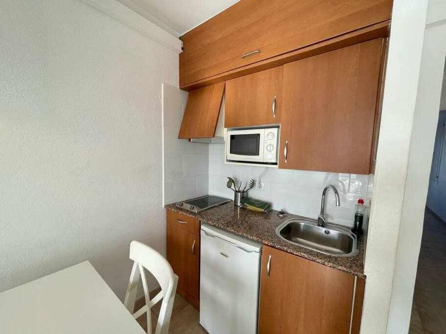 Kuchyň nebo kuchyňský kout v ubytování Pregonda - Apartamento con piscina y junto a playa