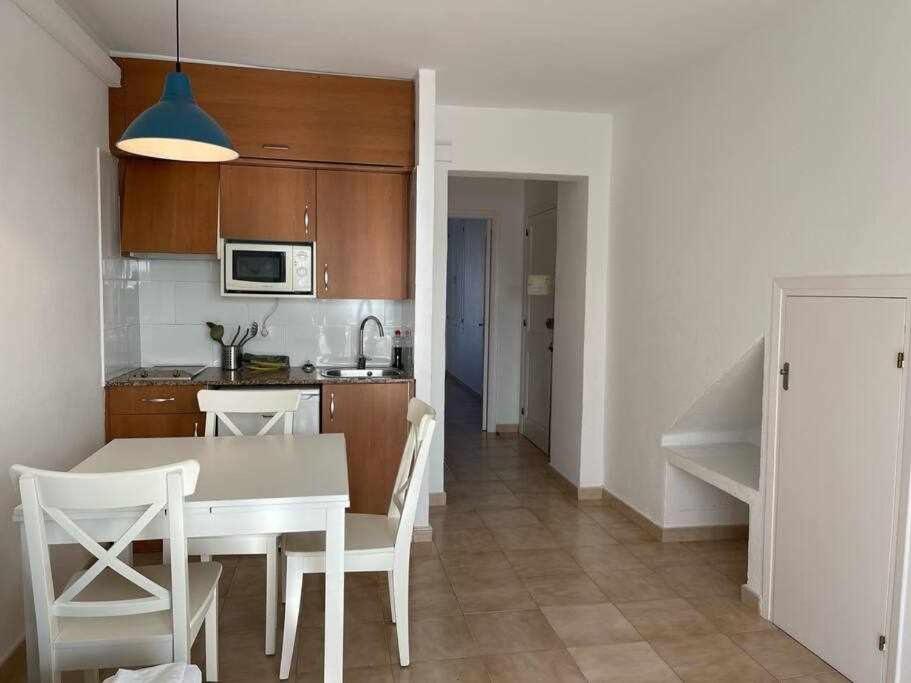 Kuchyň nebo kuchyňský kout v ubytování Pregonda - Apartamento con piscina y junto a playa