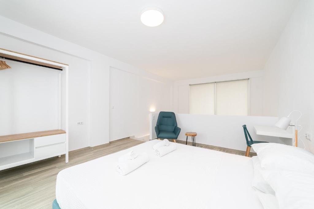 Postel nebo postele na pokoji v ubytování Anastasia Residential Complex