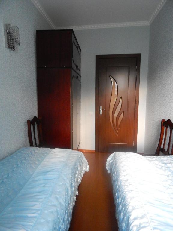 Postel nebo postele na pokoji v ubytování Ineza's Guest House