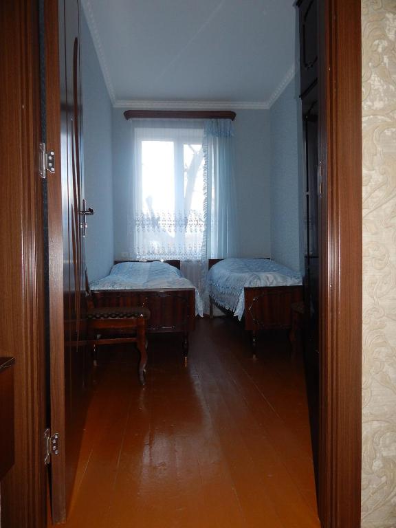 Postel nebo postele na pokoji v ubytování Ineza's Guest House