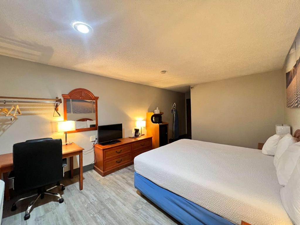 Postel nebo postele na pokoji v ubytování Antelope Inn & Suites