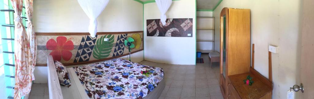 Postel nebo postele na pokoji v ubytování Waya Lailai Eco Haven