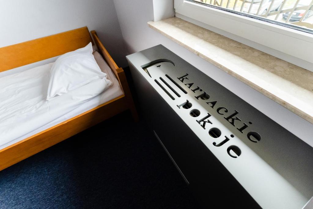 Postel nebo postele na pokoji v ubytování Karpackie Pokoje