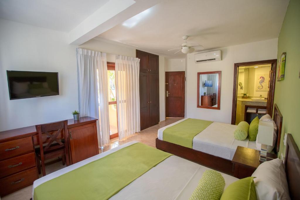 Cama o camas de una habitación en Hotel whala!bávaro - All Inclusive