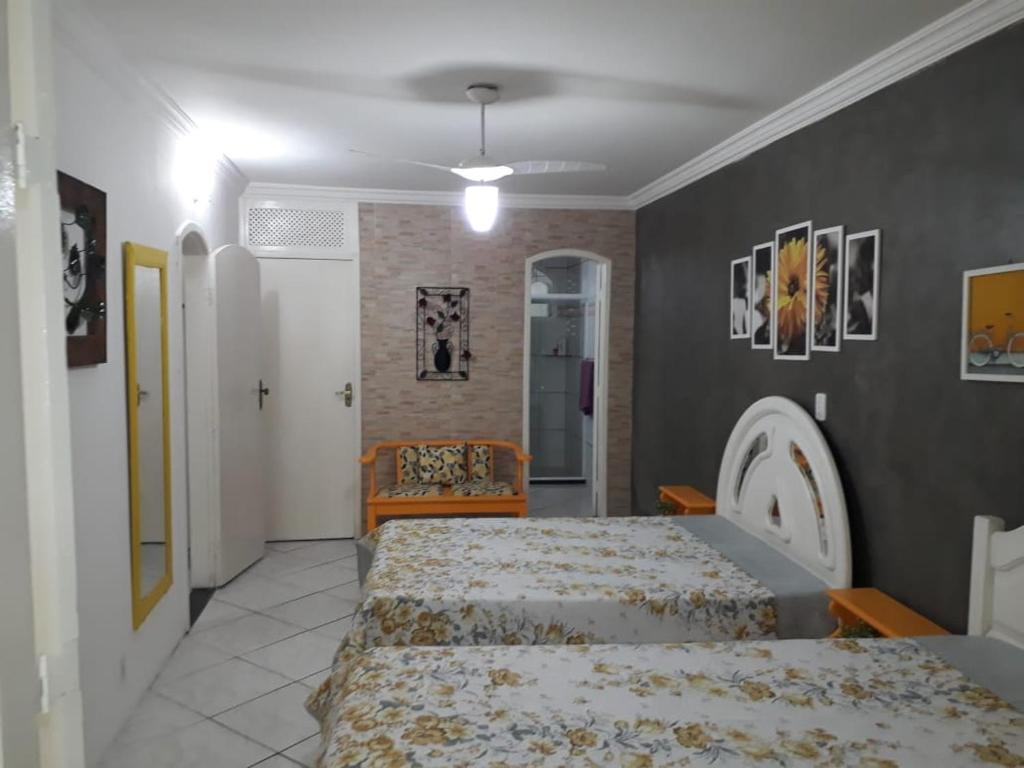 En eller flere senge i et værelse på Varandas da Praia