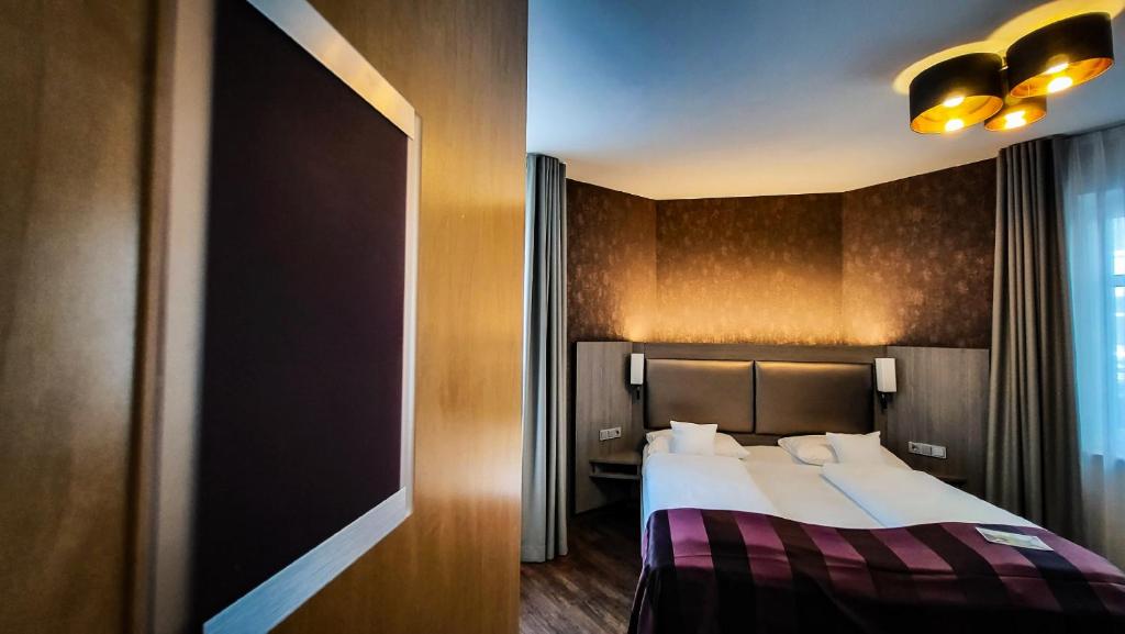 Postel nebo postele na pokoji v ubytování Best Western Plus Hotel Willingen