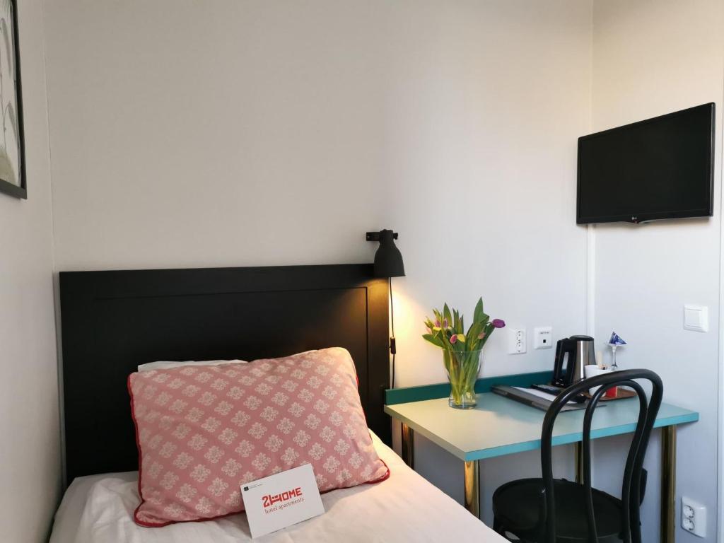 Postel nebo postele na pokoji v ubytování 2Home Hotel Gävle