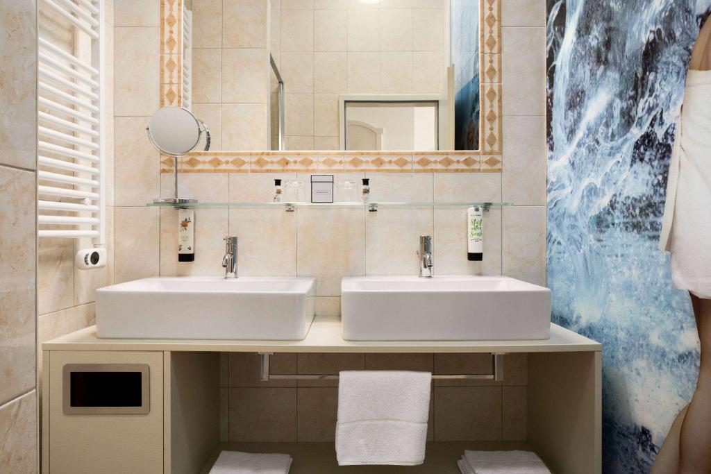 Koupelna v ubytování Amedia Plaza Wels, Trademark Collection by Wyndham