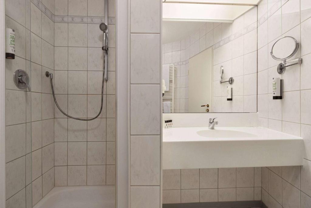 Koupelna v ubytování Amedia Weiden, Trademark Collection by Wyndham