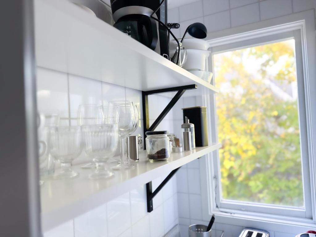 Kuchyň nebo kuchyňský kout v ubytování Strandgården Karlstad