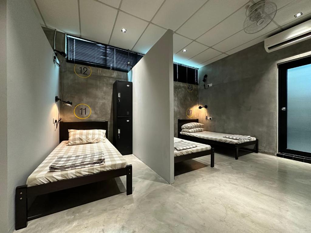 Postel nebo postele na pokoji v ubytování M-Stay Hostel