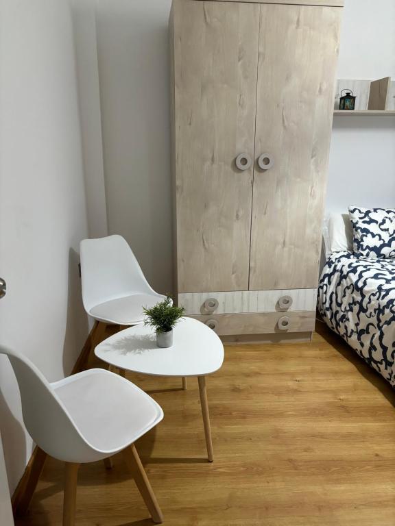 Postel nebo postele na pokoji v ubytování Casa Ubedí en pleno casco histórico