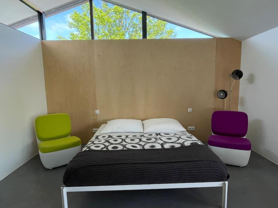 Postel nebo postele na pokoji v ubytování Ferienhaus Bergblick 170qm nur 5 min zum Chiemsee