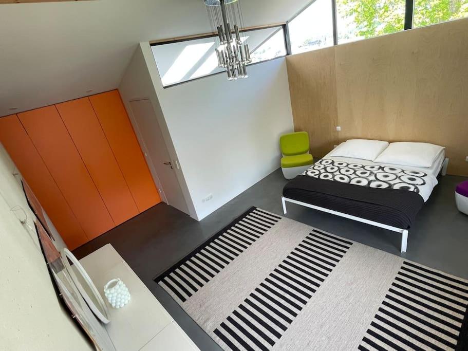 Postel nebo postele na pokoji v ubytování Ferienhaus Bergblick 170qm nur 5 min zum Chiemsee