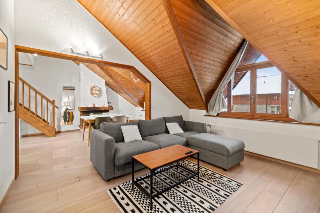 Posezení v ubytování Cosy appartement lumineux et spacieux à Charmey