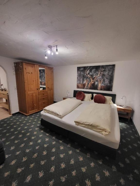 Postel nebo postele na pokoji v ubytování Hotel Post - Garni