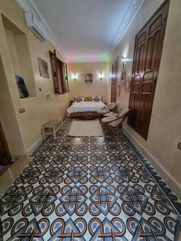 Postel nebo postele na pokoji v ubytování RIAD LALLA ZINEB