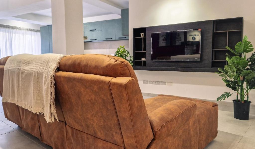 TV a/nebo společenská místnost v ubytování Mgarr ix-Xini Holiday apartment