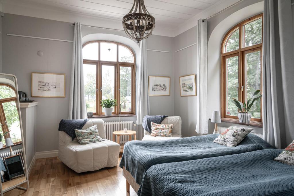 Postel nebo postele na pokoji v ubytování Vita Huset på Österlen