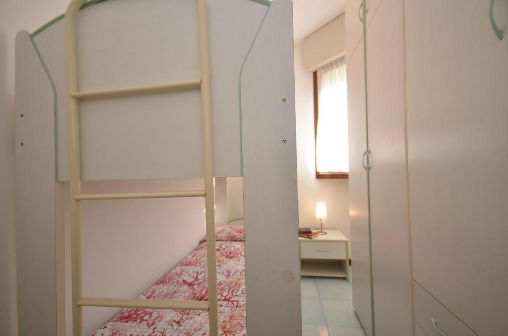 Łóżko lub łóżka w pokoju w obiekcie Residenza Marco Polo