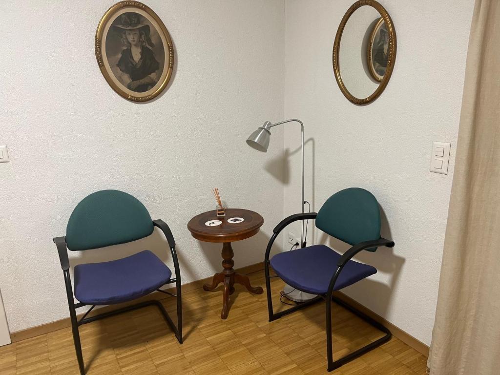 Posezení v ubytování Grande chambre avec Salle de Bains Privative