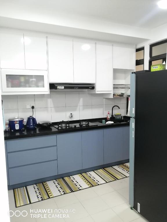 Kuchyň nebo kuchyňský kout v ubytování KASTURI GUEST HOUSE PUTRAJAYA