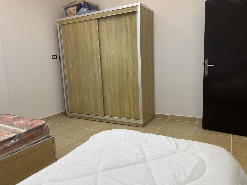 Postel nebo postele na pokoji v ubytování Oskar Appartment