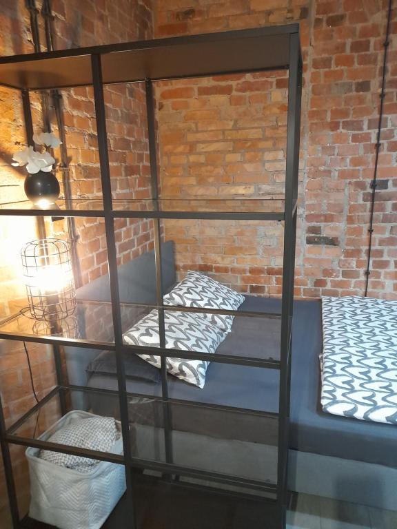Posteľ alebo postele v izbe v ubytovaní Studio Loft apartament 5 min od Starego Rynku, Poznań NETFLIX
