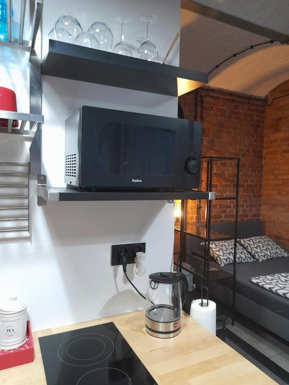 Posteľ alebo postele v izbe v ubytovaní Studio Loft apartament 5 min od Starego Rynku, Poznań NETFLIX
