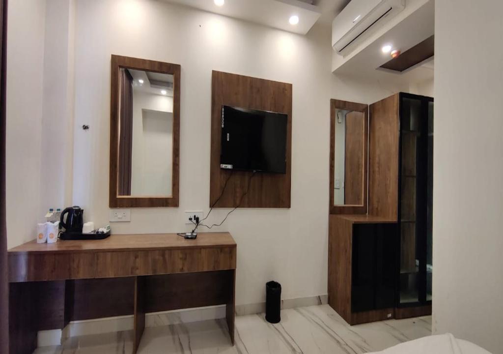 TV a/nebo společenská místnost v ubytování PK Boutique Hotel