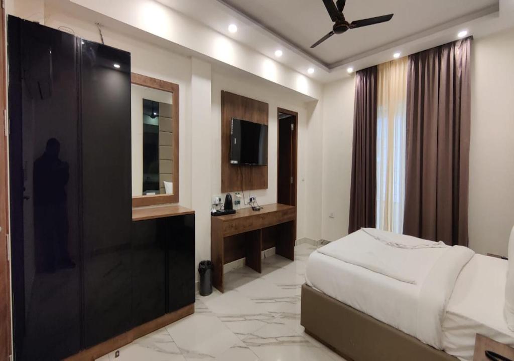 Postel nebo postele na pokoji v ubytování PK Boutique Hotel
