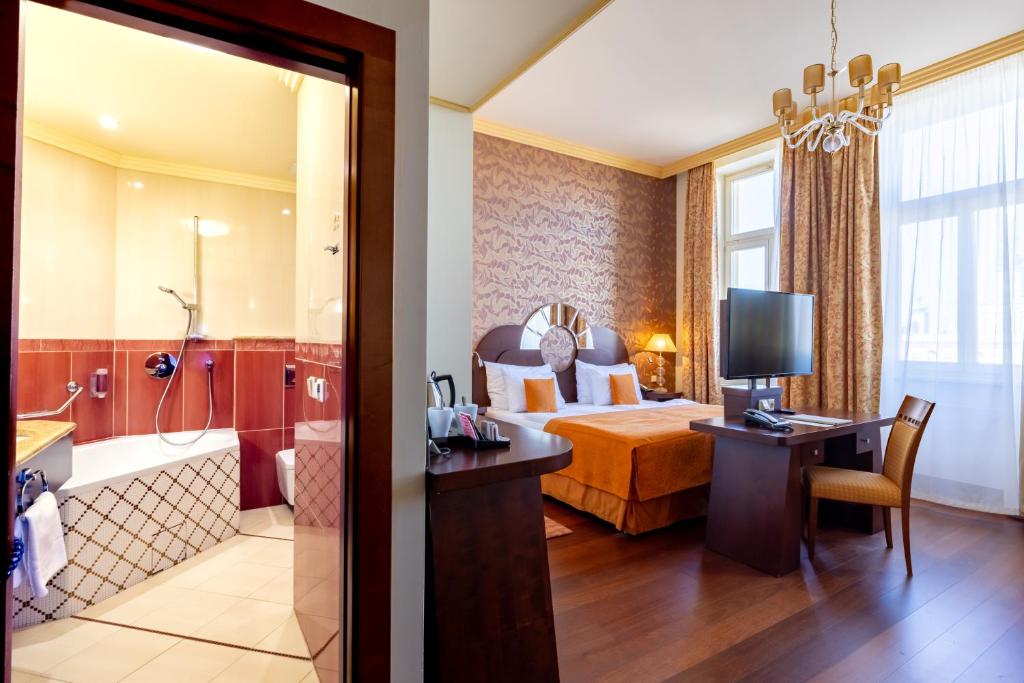 Voodi või voodid majutusasutuse Grandhotel Zvon toas
