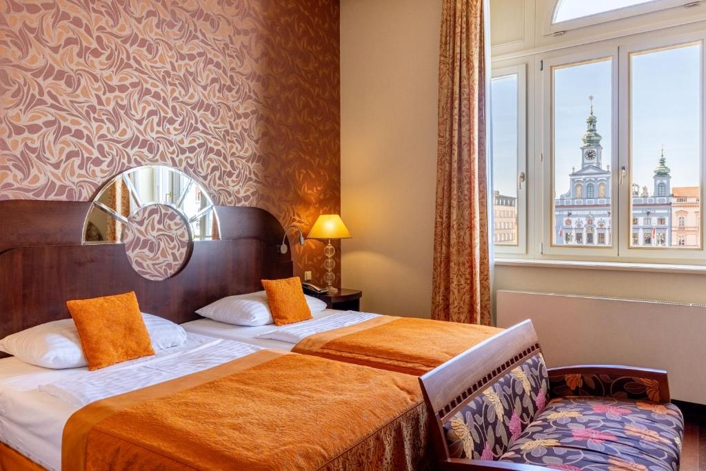 Voodi või voodid majutusasutuse Grandhotel Zvon toas