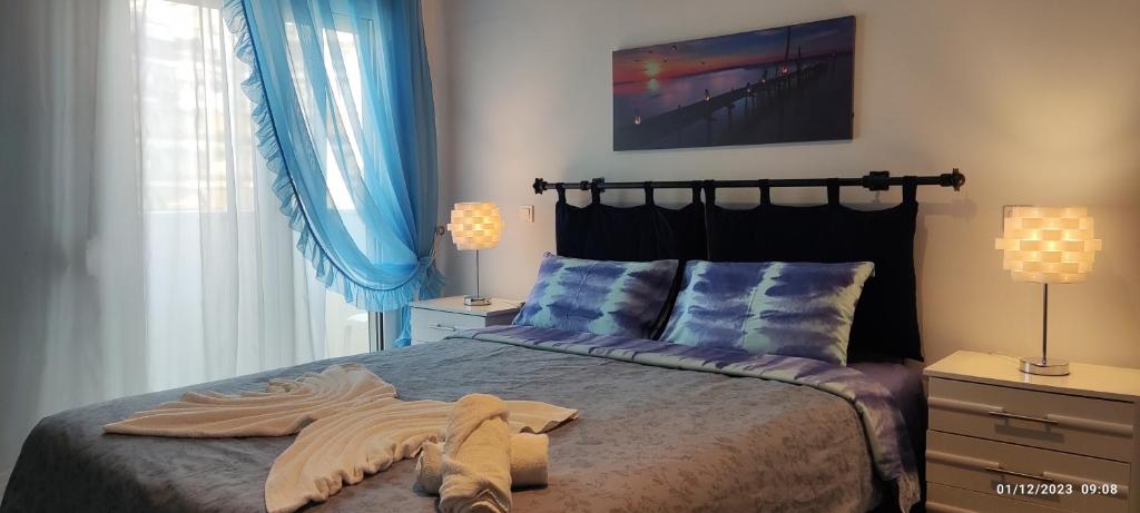 Postel nebo postele na pokoji v ubytování Delphitea Philoxenia
