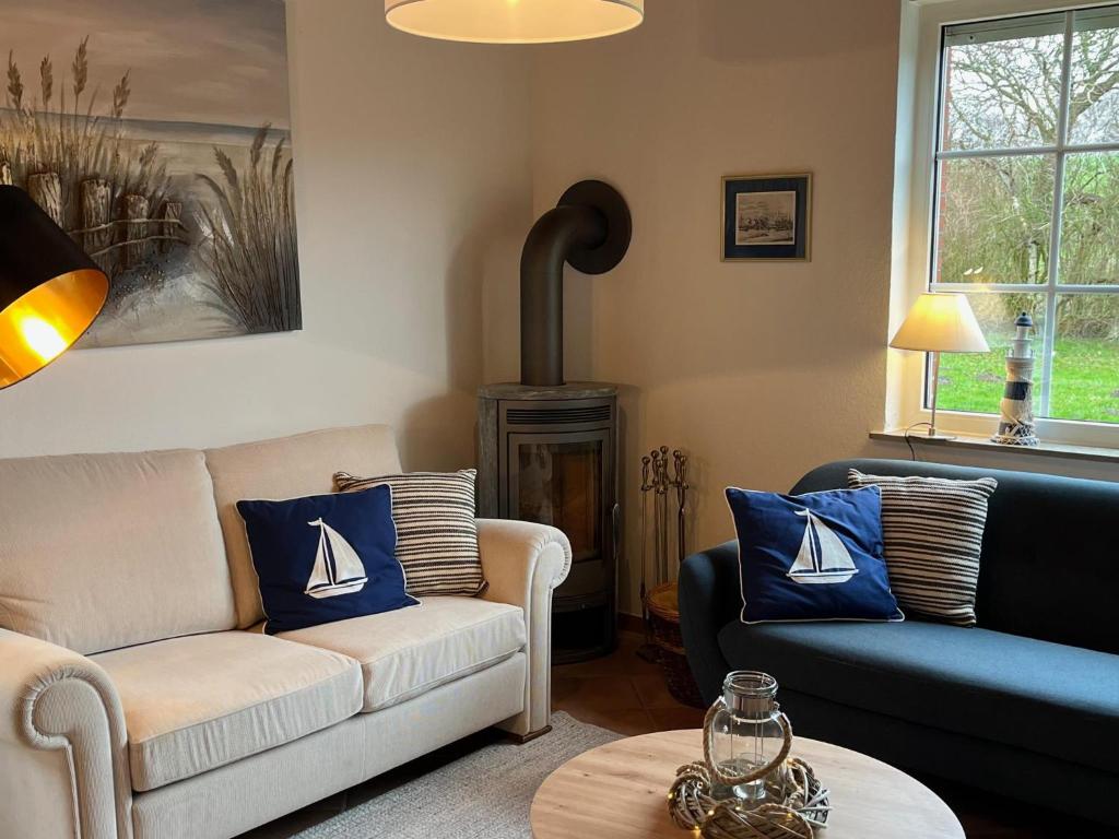 Posezení v ubytování Ferienhaus Kompassqualle