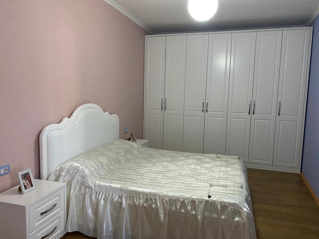 Postel nebo postele na pokoji v ubytování Vila Kani