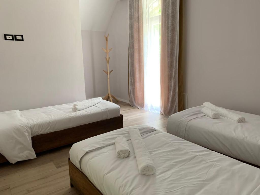 Postel nebo postele na pokoji v ubytování Stonehouse villa