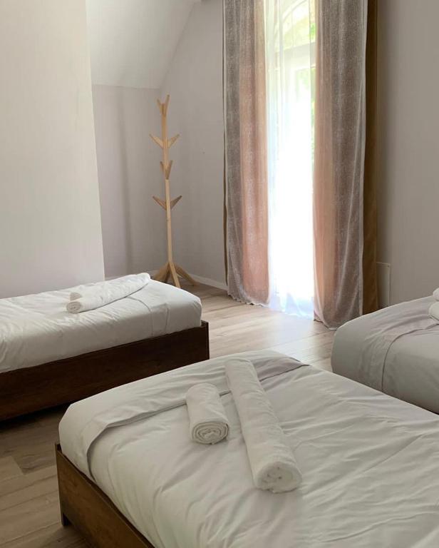 Postel nebo postele na pokoji v ubytování Stonehouse villa