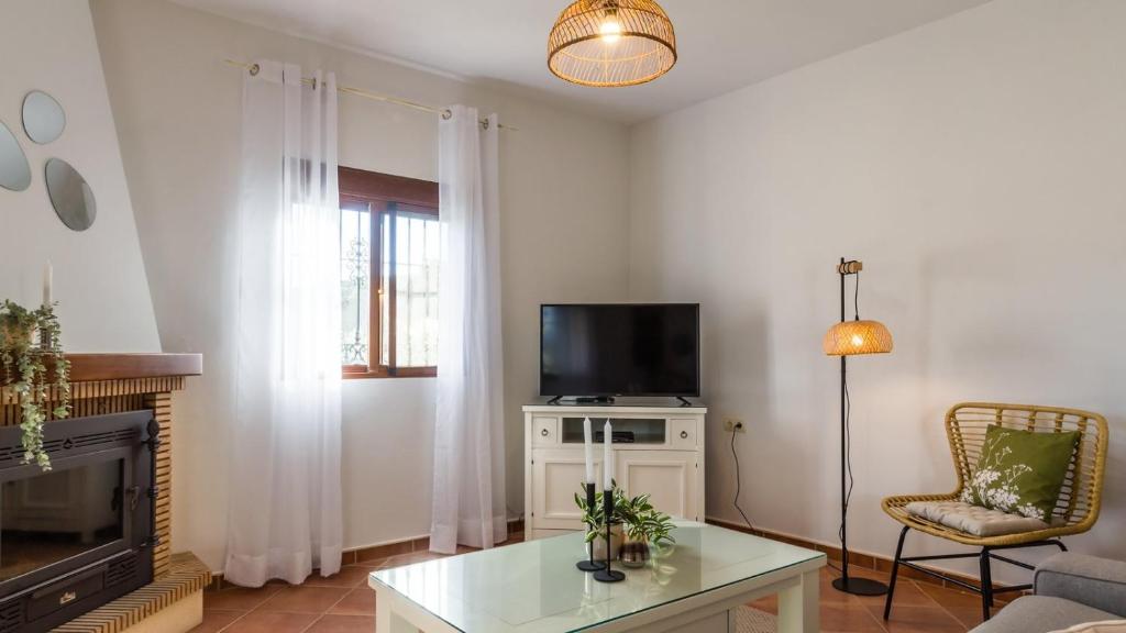 TV a/nebo společenská místnost v ubytování Cortijo Angela Viñuela by Ruralidays