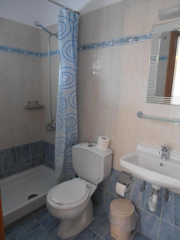 A bathroom at Apartments Palladium