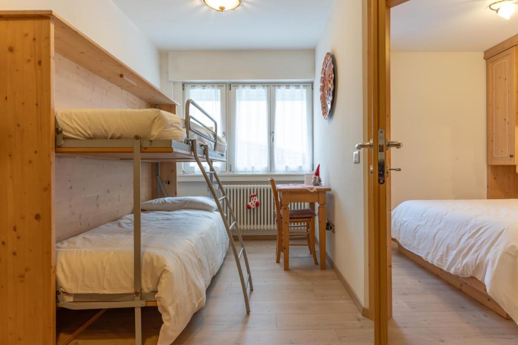 Postel nebo postele na pokoji v ubytování Bilo al Piccolo Gufo