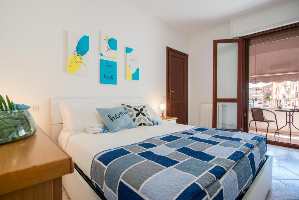Säng eller sängar i ett rum på [Oristano centro] Parcheggio privato, Wifi+Netflix