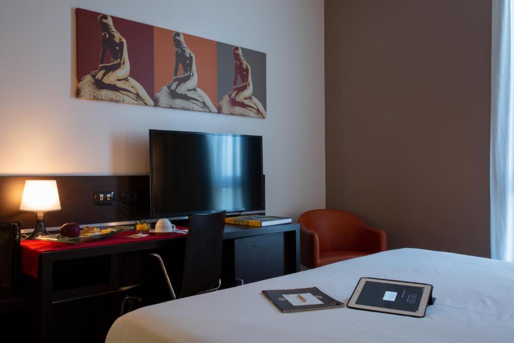 TV a/nebo společenská místnost v ubytování Euro Hotel Residence