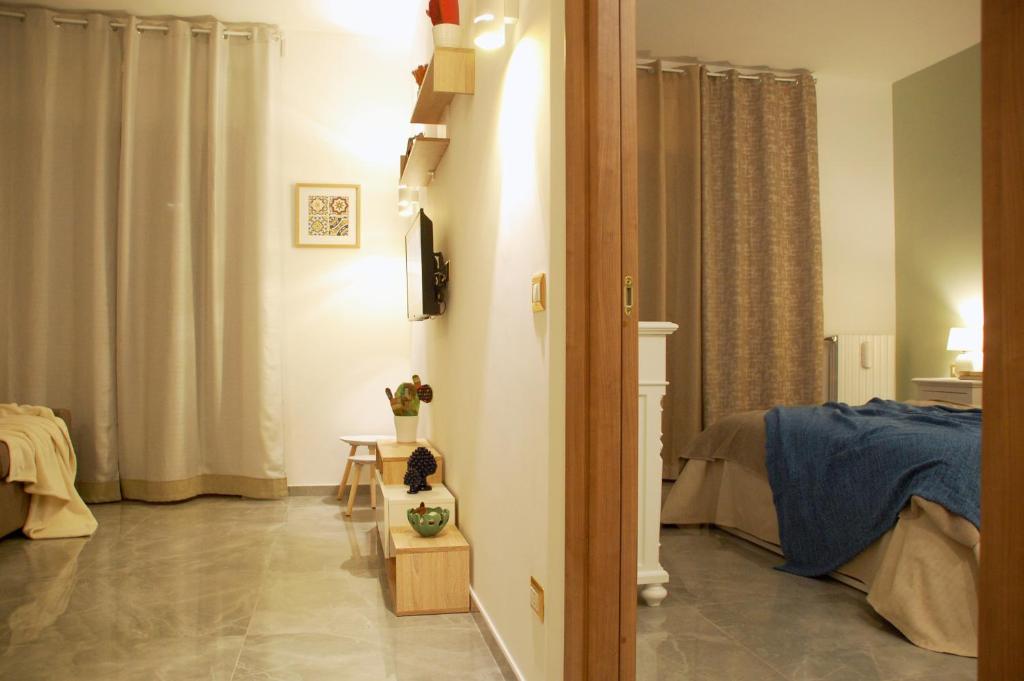 Postel nebo postele na pokoji v ubytování Dimore del Sud