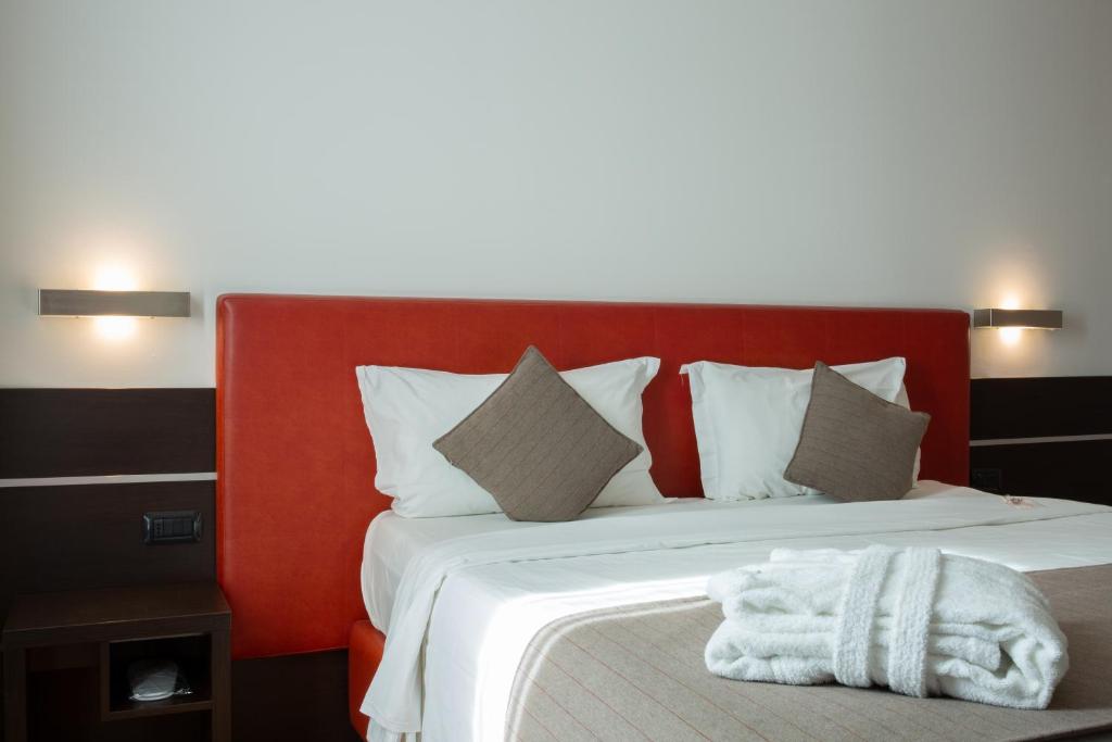 Postel nebo postele na pokoji v ubytování Euro Hotel Residence